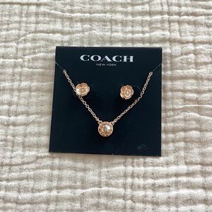 Coach rose gold (tone) earring and necklace set new